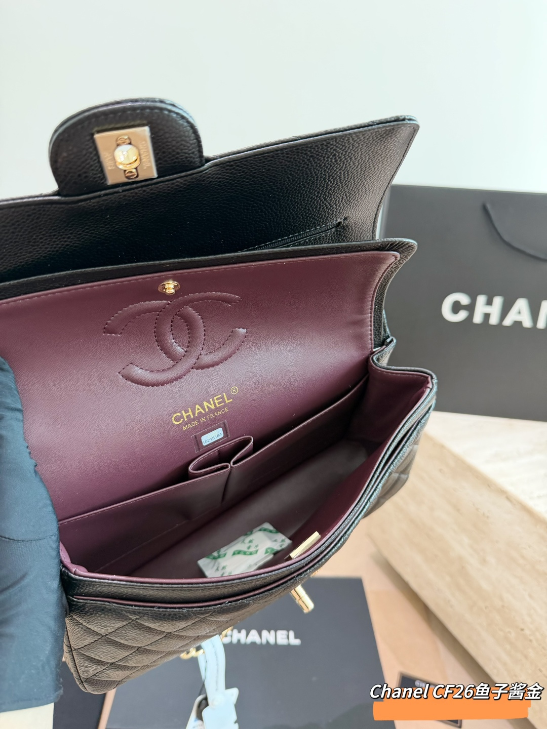 Chanel Classic Flap Bag (CF) in Upgraded Black Caviar Leather with Gold Hardware